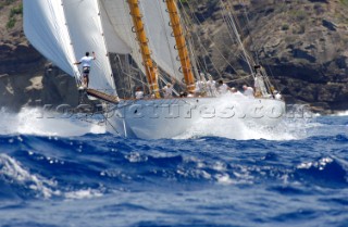 Antigua Classic Yacht Regatta April 2006. One of sequence of five pictures of bowman standing at end of bowsprit directing operations on a large boat