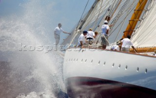 Antigua Classic Yacht Regatta April 2006. One of sequence of five pictures of bowman standing at end of bowsprit directing operations on a large boat