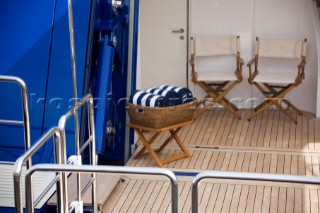 Deck chairs and beach towels on a swim platform