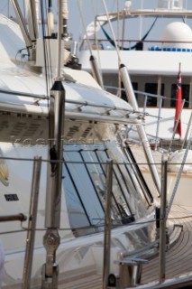 Side windows and cabin deckhouse on a sailing superyacht in port