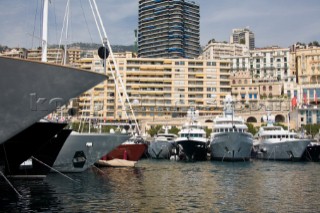 Line up of bows of superyachts and motoryachts moored in harbour at the Monaco Yacht Show