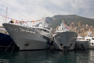 Line up of bows of superyachts and motoryachts moored in harbour at the Monaco Yacht Show