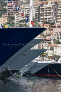 Line up of bows of superyachts and motoryachts moored in harbour at the Monaco Yacht Show