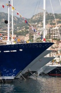 Line up of bows of superyachts and motoryachts moored in harbour at the Monaco Yacht Show