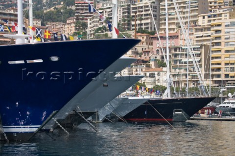 Line up of bows of superyachts and motoryachts moored in harbour at the Monaco Yacht Show
