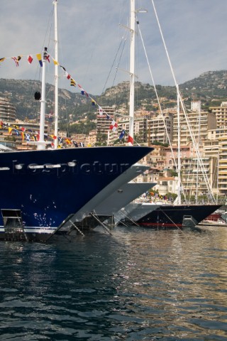 Line up of bows of superyachts and motoryachts moored in harbour at the Monaco Yacht Show