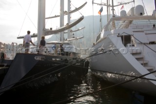 The high tech and modern technology design masts of the superyacht megayacht Maltese Falcon owned by Tom Perkins, alongside the megayacht Mirabella V