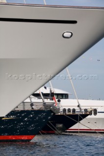 Line up of bows of superyachts and motoryachts moored in harbour at the Monaco Yacht Show