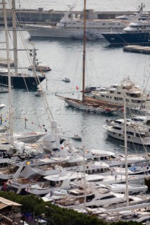 Mega yachts and superyachts moored in Monaco harbour, where cruise ships now also have berths