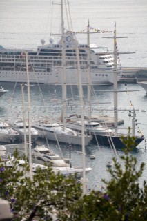 Mega yachts and superyachts moored in Monaco harbour, where cruise ships now also have berths