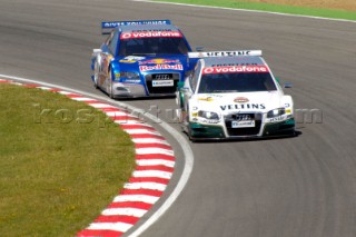 Heinz-Harald Frentzen holding off eventual winner Mattias Ekstršm during the DTM at Brands Hatch on July 2nd 2006