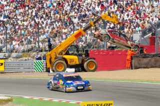 Vanina Ickxs Audi gets a little help leaving the circuit after the DTM at Brands Hatch on July 2nd 2006