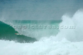 Dramatic action as Luke Munro shoots a tube at the Hossegor Seignosse France Rip Curl Pro 2005