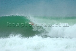 Dramatic action as Brazilian Paulo Moura shoots a tube at the Hossegor Seignosse France Rip Curl Pro 2005