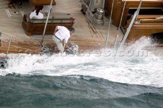 PALMA, MAJORCA - October 12th 2006: The sail trimmers control the massive sheet winches holding tons of sail pressure onboard the massive 32 metre Frers designed superyacht Bolero during Race 1 of the Superyacht Cup on October 12th 2006. The Superyacht Cup brings together the most luxurious cruising yachts in the world for racing and social activities. The race was won by American yacht Virago, owned and driven by Stuart Townsend. (Photo by Kos/Kos Picture Source)