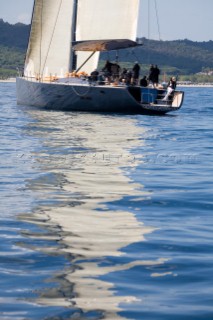 SAINT-TROPEZ, FRANCE - The Wally yacht Open Season owned by the Chairman of the Bugatti Car Company, drifts on a glassy sea whilst becalmed during racing on October 5th 2006 in the Voiles de Saint Tropez. The largest classic and modern yachts from around the world gather in Saint-Tropez annually for a week of racing and festivities to mark the end of the Mediterranean season, before heading across the Atlantic to winter in the Caribbean.