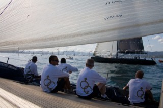 SAINT-TROPEZ, FRANCE - October 5th: The crew onboard the Wally maxi yacht Dangerous But Fun of Monaco owned by Michelle Perris sit to leeward to help fill the sails during racing on October 5th 2006. The largest classic and modern yachts from around the world gather in Saint-Tropez annually for a week of racing and festivities to mark the end of the Mediterranean season, before heading across the Atlantic to winter in the Caribbean.