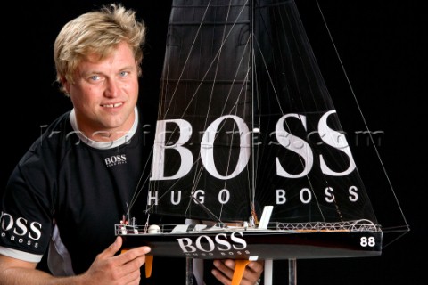 BILBAO SPAIN  October 22nd 2006 Alex Thomson GBR skipper of Open 60 monohull HUGO BOSS with a model 