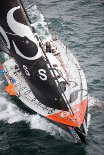 BILBAO, SPAIN - October 22nd 2006: Alex Thomson (GBR) onboard his Open 60ft monohull HUGO BOSS. The Velux 5 Oceans is a three part round the world yacht race for the bravest of solo sailors. Leg 1 is approximately 12,000 miles from Bilbao in Spain to Fremantle in Western Australia. It is the ultimate test of sailing skill, stamina and endurance. (Rights restrictions may apply)