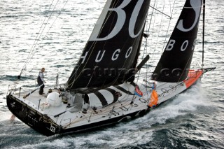 BILBAO, SPAIN - October 22nd 2006: Alex Thomson (GBR) onboard his Open 60ft monohull HUGO BOSS. The Velux 5 Oceans is a three part round the world yacht race for the bravest of solo sailors. Leg 1 is approximately 12,000 miles from Bilbao in Spain to Fremantle in Western Australia. It is the ultimate test of sailing skill, stamina and endurance. (Rights restrictions may apply)