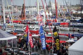 ST. MALO, FRANCE - OCTOBER 27th 2006: The Open 60 trimarans and monohull classes are watched by crowds of spectators as they prepare in St. Malo, France on October 27th and 28th for the trans-atlantic race start on Sunday October 29th 2006. The Route du Rhum is a challenging race for solo sailors which starts in St Malo and finishes in Pointe a Pitre, Guadeloupe.