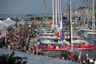 ST. MALO, FRANCE - OCTOBER 27th 2006: The Open 60 trimarans and monohull classes are watched by crowds of spectators as they prepare in St. Malo, France on October 27th and 28th for the trans-atlantic race start on Sunday October 29th 2006. The Route du Rhum is a challenging race for solo sailors which starts in St Malo and finishes in Pointe a Pitre, Guadeloupe.