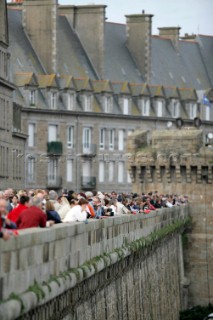 ST. MALO, FRANCE - OCTOBER 27th 2006: The Open 60 trimarans and monohull classes are watched by crowds of spectators as they prepare in St. Malo, France on October 27th and 28th for the trans-atlantic race start on Sunday October 29th 2006. The Route du Rhum is a challenging race for solo sailors which starts in St Malo and finishes in Pointe a Pitre, Guadeloupe.