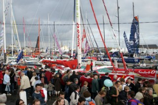 ST. MALO, FRANCE - OCTOBER 27th 2006: The Open 60 trimarans and monohull classes are watched by crowds of spectators as they prepare in St. Malo, France on October 27th and 28th for the trans-atlantic race start on Sunday October 29th 2006. The Route du Rhum is a challenging race for solo sailors which starts in St Malo and finishes in Pointe a Pitre, Guadeloupe.