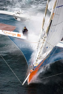 LORIENT, FRANCE: Skipper Steve Ravussin (SUI)  training onboard his Open 60 trimaran ORANGE PROJECT on October 6th 2006 in preparation for the Route du Rhum trans-atlantic race start on Sunday October 29th 2006. The Route du Rhum is a challenging race for solo sailors which starts in St Malo and finishes in Pointe a Pitre, Guadeloupe.  (Rights restrictions may apply)