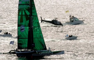 06_15717 ST MALO, FRANCE,  29 October 2006 . ROUTE DU RHUM-LA BANQUE POSTALE,Single-handed transatlantic sailing race : St Malo (FRA) / Ponte a Pitre (Guadeloupe/ French West Indies) 3543 NM . . Start from St Malo on 29th Oct. Open 60 multihull GROUPAMA , skipper Franck Cammas (FRA) surronded by Press boats and TV helicopter.