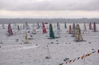 ST. MALO, FRANCE - OCTOBER 29th 2006: The Open 60 trimarans and monohull classes are watched by crowds of spectators as they start the Route du Rhum trans-atlantic race off St. Malo, France, on October 29th. The Route du Rhum is a challenging race for solo sailors which starts in St Malo and finishes in Pointe a Pitre, Guadeloupe. (Photo by Gilles Martin-Raget/Kos Picture Source via Getty Images)