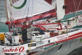 ST. MALO, FRANCE - OCTOBER 29th 2006: Thomas Colville (Fra) on his trimaran Sodebo starts the Route du Rhum. The Open 60 trimarans and monohull classes are watched by crowds of spectators as they start the Route du Rhum trans-atlantic race off St. Malo, France, on October 29th. The Route du Rhum is a challenging race for solo sailors which starts in St Malo and finishes in Pointe a Pitre, Guadeloupe. (Photo by Gilles Martin-Raget/Kos Picture Source via Getty Images)