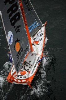 ST. MALO, FRANCE - OCTOBER 29th 2006: Vincent Riou (Fra) on his Open 60 monohull PRB starts the Route du Rhum. The Open 60 trimarans and monohull classes are watched by crowds of spectators as they start the Route du Rhum trans-atlantic race off St. Malo, France, on October 29th. The Route du Rhum is a challenging race for solo sailors which starts in St Malo and finishes in Pointe a Pitre, Guadeloupe. (Photo by Gilles Martin-Raget/Kos Picture Source via Getty Images)