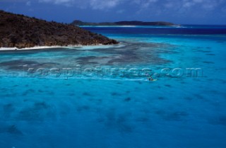 British Virgin Islands - Caribbean. Eustatia Island. Lonely Surfer