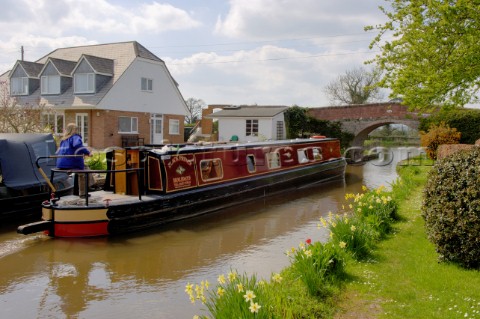 Narrow boat passing moorings on Llangollen canal near Frankton JunctionWelsh FranktonShropshireEngla