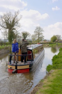 Narrow boat on the Llangollen canal approaching the junction with the Montgomery canal at Frankton Junction,Welsh Frankton,Shropshire,England.April 2006.