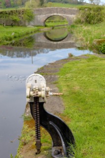 Paddle gear above Brithdir locks,Montgomery canal,with Bridge 125 in the background,near Berriew,Powys,Wales,UK.May 2006.