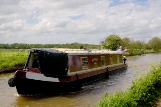 Narrow boat on the Prees branch,Llangollen canal,near Whixall,Shropshire,England,UK.May 2006.