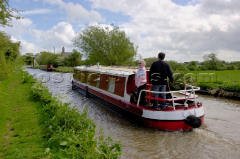 Narrow boat approaching Allmans Lift bridge No1 on the Prees branchLlangollen canalnear WhixallShrop