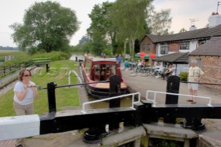 Locking through outside the Willey Moor Lock Tavern,near Whitchurch,Shropshire,England.July 2006.