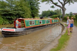 Narrowboat having just descended the Grindley Brook locks,Llangollen canal,Whitchurch,Shropshire,England.July 2006.