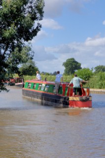 People on narrow boat on the Llangollen canal at Ellesmere,Shropshire,England.