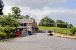 Narrow boats moored near the British Waterways depot on the Llangollen canal at Ellesmere,Shropshire,England,UK.July 2006.