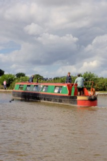 People on narrow boat on the Llangollen canal at Ellesmere,Shropshire,England.