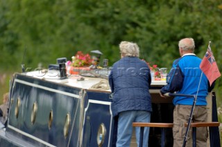 Couple on narrow boat,Llangollen canal,Bettisfield,Clwyd,Wales,August 2006.