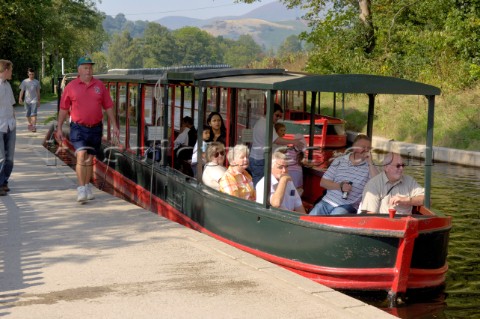 Visitors on the trip boat on the Llangollen canal at Llangollen wharfClwydWalesSeptember 2006