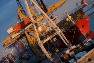 Valencia, Port of Valencia. Container ship being loaded with cargo and containers