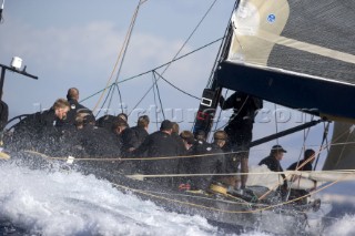 The quarter wave of an Americas Cup yacht at speed.