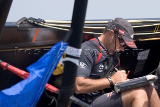 Navigator using onboard computer on Team New Zealand