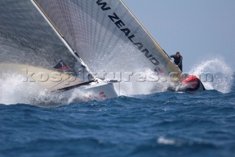 Bow shot of bowman on Team New Zealand alongside BMW Oracle